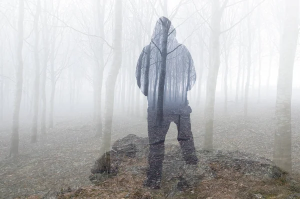 Double Exposure Looking Back Hooded Figure Looking Out Moody Forest — Stock Photo, Image