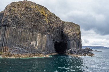 Fingal's Cave is a sea cave on the uninhabited island of Staffa, in the Inner Hebrides of Scotland clipart