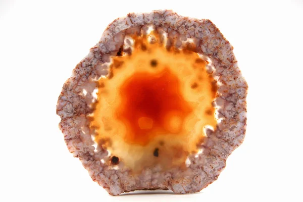 Amazing orange Agate Crystal tvärsnitt med bakgrundsbelysning isolerad på vit bakgrund. — Stockfoto