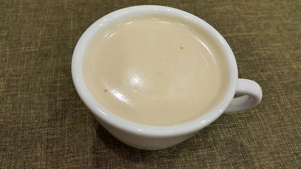 Bir fincan kahve. Kahve ahşap yüzeye