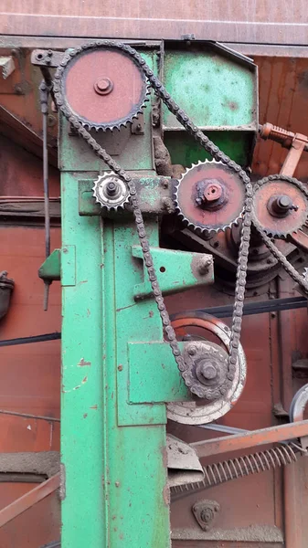 Mechanism. Old gear with iron gears and pulleys