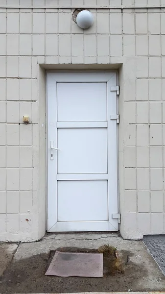 metal-plastic entrance doors in the wall opening