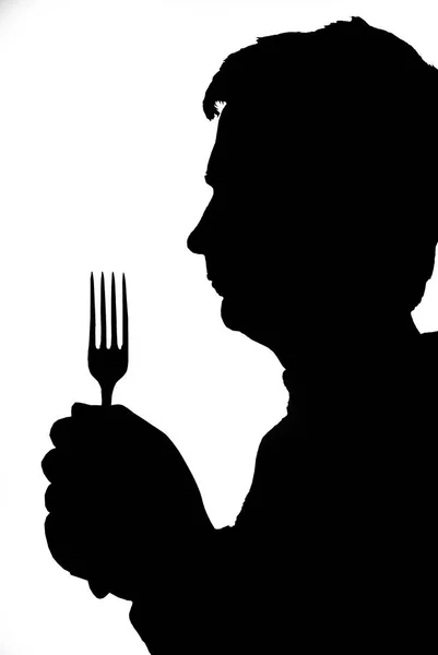 Silueta Hombre Con Tenedor Silueta Hombre Con Tenedor Comedor —  Fotos de Stock
