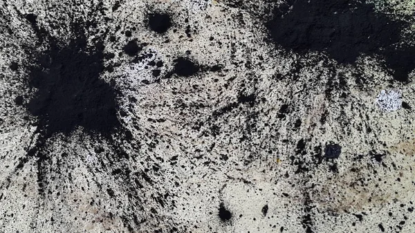 Lekeler. Arka planda görüldü. Yüzeyde lekeler var. Soyut taşra