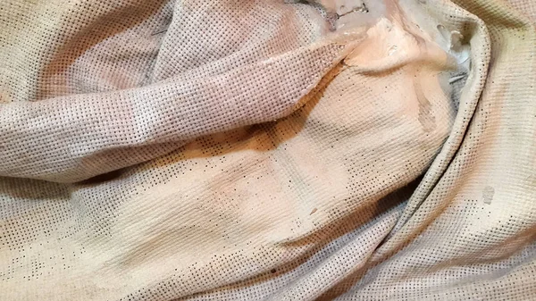 Pano sujo. Um pano sujo e duro. A superfície do tecido. Backgro abstrato — Fotografia de Stock