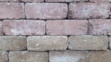 Tuğlaların klasik arka planı. Tuğla işi. Tuğla duvar Taş ustasının fotoğrafı.