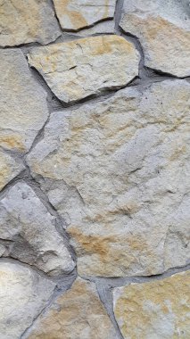 Natural stone. The wall is made of natural sandstone. Stone trim clipart