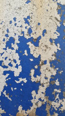 Eski boyaları soyuyorum. Yıpranmış boyalı yüzey. Eski arkaplan