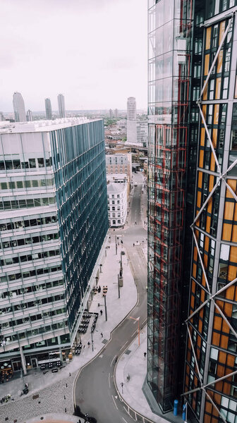 LONDON, UK - CIRCA JUNE 2019: view of business district of central London from Tate Modern observation deck on a moody day.