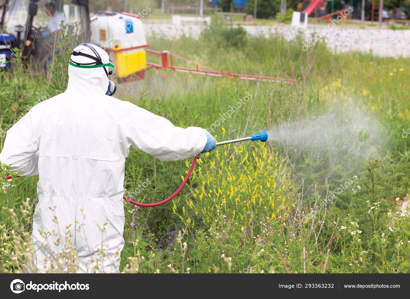 Man In Protective Workwear Spraying Herbicide On Ragweed In An Urban Area Weed Control Stock Photo By C Macor 293363232