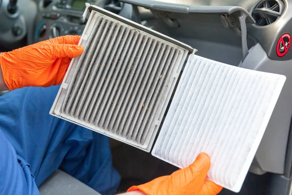 Чистый и грязный фильтр воздуха для пыльцы в салоне автомобиля — стоковое фото