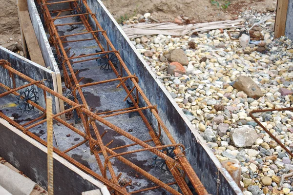 Fittings in a timbering for cementation of the base. Building co — Stock Image Fittings in a timbering for cementation of the base. Building co Stock Image
