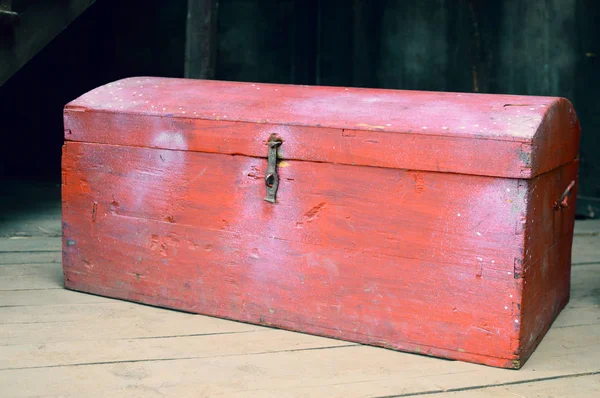 old wooden red chest in the house