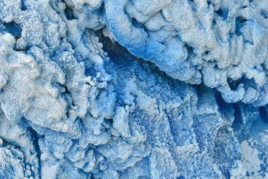 Soyut kabartmalı mavi arka plan.