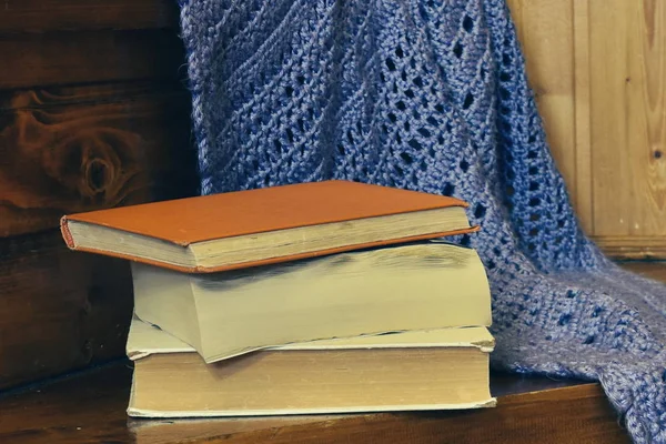 Old books and blue plaid. — ストック写真