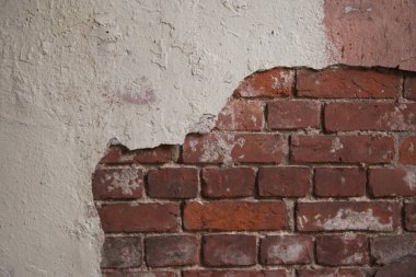 Alçılı eski tuğla duvar dokusu.