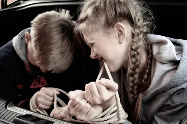 Crimes with children. Victims of children in trunk of car. Illegal Imprisonment — Stock Photo, Image