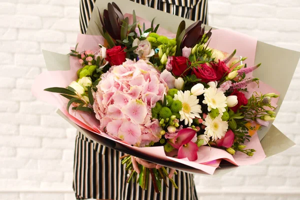 Woman holds in hands beautiful bouquet of flowers. Women's Day, Valentine's Day — Stock Photo, Image