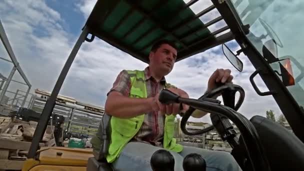 Caucasian Man Warehouse Worker Dressed Reflective Vest Working Forklift Outdoors — Stock Video