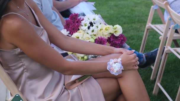 Guests With A flower Bouquets Applaused Sitting on a Wedding Ceremony — Stock Video