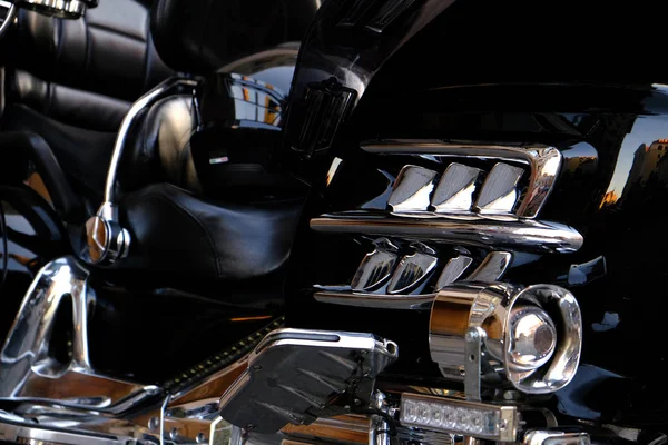 Engine chrome parts of a black Luxury motorcycle close-up. — Stock Photo, Image