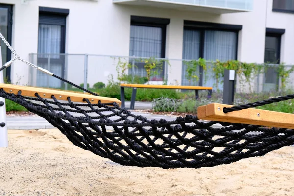 Hammock close-up on a playground in a cozy courtyard of modern r — Stock Photo, Image