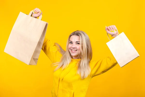 Portrait Young Happy Caucasian Blonde Woman Paper Eco Bags Yellow — Stock Photo, Image