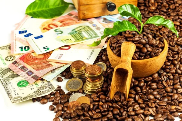 Coffee beans and money. Fair Trade. Sale of coffee. Commodity trade. Fresh coffee beans