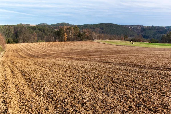 Plowed field. Life on the farm. Agricultural industry. Landscape in the Czech Republic. Autumn in the fields