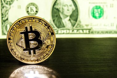 Altın Bitcoin sikkesi abd doları yakın. Bitcoin kripto para birimi. Kripto para birimi kavramı. 