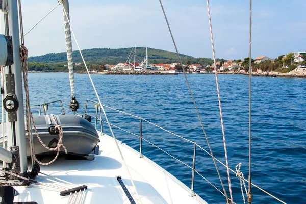 Port of Sucuraj on island Hvar, Croatia, view from yacht. Holiday in Croatia. Ship transportation. Yachting sport.