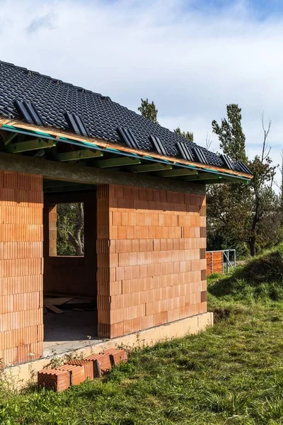 Construction site of a brick family house in the Czech countryside. House construction. Brick house.