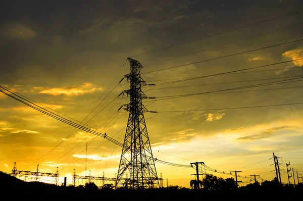 Hochspannungsmast Hochspannungsmast Silhouette Von Hochspannungsmast Sonnenuntergang Orange Gelber Himmel Hintergrund — Stockfoto