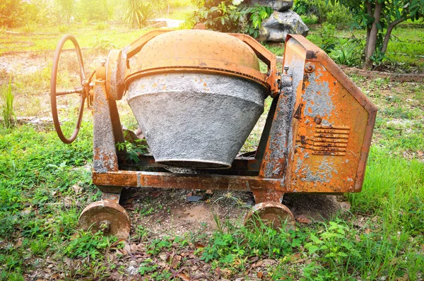 old concrete mixer machine / tool of concrete mixer machine rust at construction working site