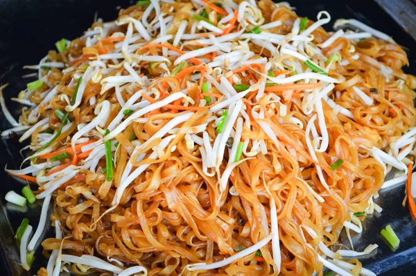 Stir fried noodles with bean sprouts Thai food / Pad Thai rice noodles stir fried in street food