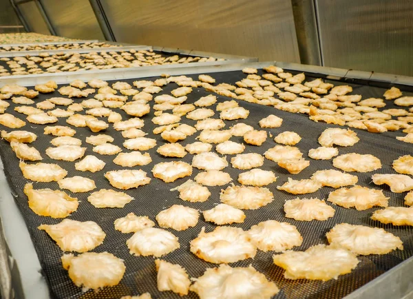 Dried fruit / Making dry fruit on net with dried pineapple in room temperature control to dry with sunlight and smoked the heat from gas