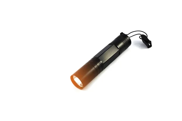 Zaklamp Geïsoleerd Met Oranje Verlichting Black Fakkel Licht Witte Achtergrond — Stockfoto