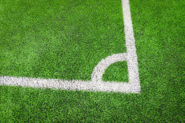 corner of footbal field / futsal or football field on green grass background with center line corner top view at sport outdoor