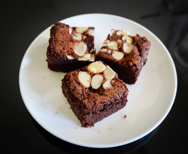 Brownies Taart Tafel Stuk Chocolade Taart Met Moer Bovenaanzicht Brownies — Stockfoto