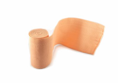 Elastik Bandaj tıbbi sargı bezi rulo üzerinde izole beyaz arka plan