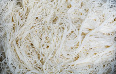 Aşçı gıda arka plan üzerinde beyaz pirinç erişte makarna 