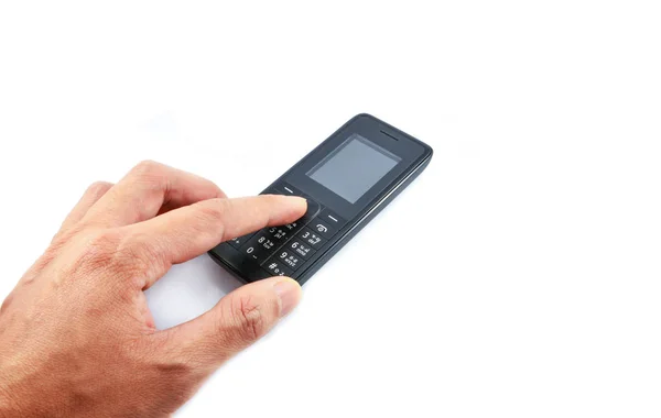 Ręka naciskając na telefon / stary model telefonu komórkowego na tle — Zdjęcie stockowe