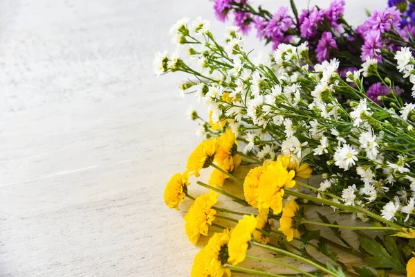 Bouquet fresh spring colorful flower with yellow mum , marguerit