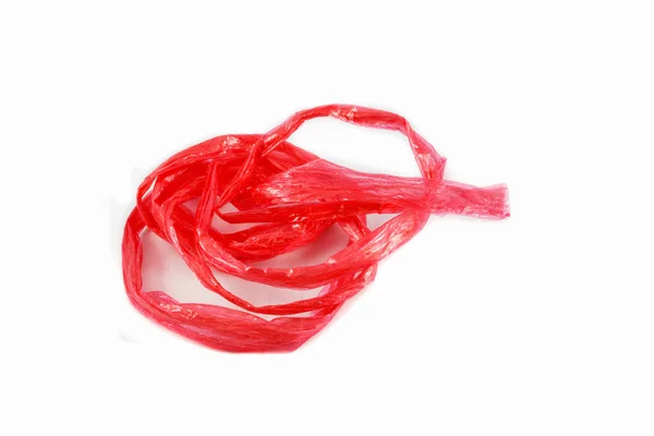 Corda di plastica rossa isolata su sfondo bianco — Foto Stock