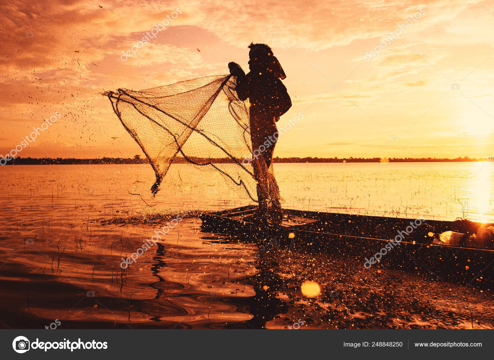 Woman Saltwater Fishing Casting from Boat during Sunrise Stock