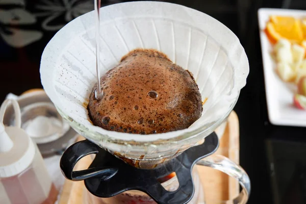 Drip coffee barista pouring water on filtered brewing / make cup — Stock Photo, Image