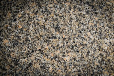 Dark gray granite tile stone floor and wall pattern background /