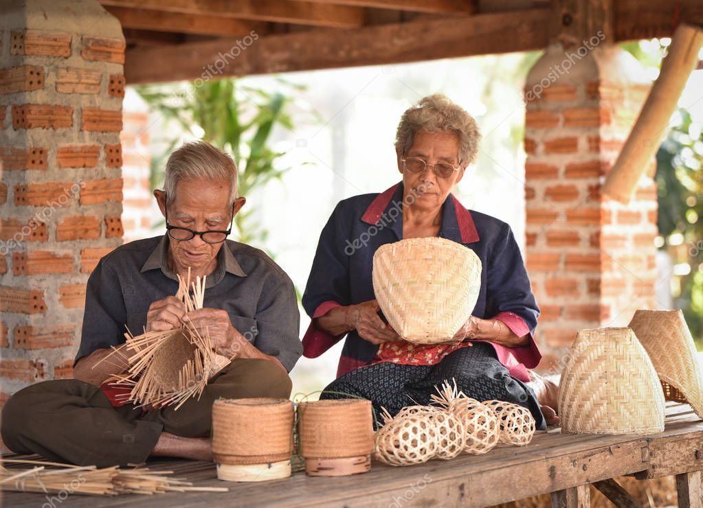 Asia life couple old man grandfather and old woman working in ho