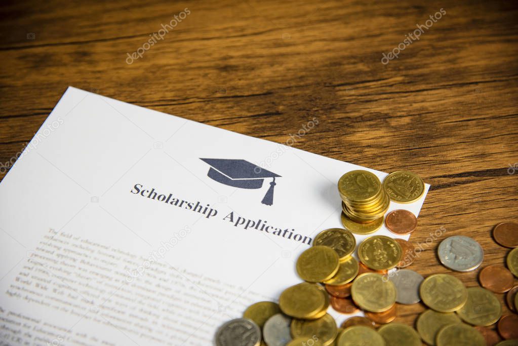 Scholarship application document contract form concept with mone