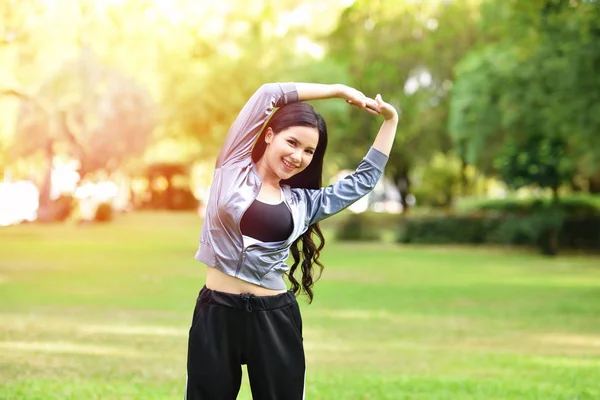 Asia Woman keep fit body exercise Stretch the muscles for health — Stock Photo, Image